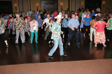 DJ Joel Morris leading the line dancers.