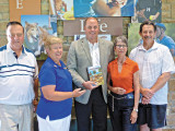 Brian Boylan accepting the first Cookbook, hot off the press.