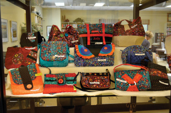 Purses on display outside the Robson Ranch Library.