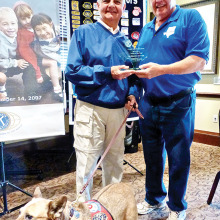 Art (and Cody) receiving his award from Bill Rauhauser, former District Governor for Texas/Oklahoma and Past President of the Kiwanis Club).