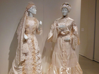 Left to right: 1874 and 1900 wedding gowns.