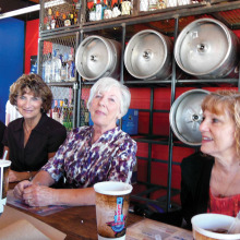 Dining under the kegs, left to right: Sally Ryerson, Phyllis Ayers, Nanci Zipes and Bert Zeitlin.