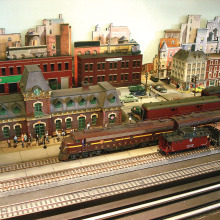 The model railroad scene located in the Arts and Technology display window.