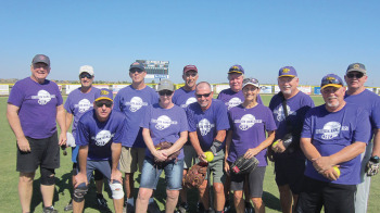 Tournament Champions, left to right front: Dennis Thomas (manager), Cindy Baker, John Blecher, Gale Hicks and Ed Spitzmueller; back: Mick Calverly, Miguel Odina, Howard Baker, Jim Reese, Jim Richardson, Doyle Hicks and Mike Mitchell