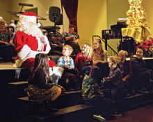 Santa and Robson grandchildren at the Christmas at the Ranch Concert. Photo by Randy Hatcher.