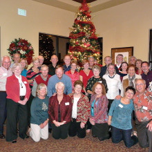 Members of the Tennis Club celebrating the holidays at their annual Christmas party.