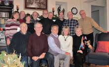 The “volleyballers” and spouses at their holiday party