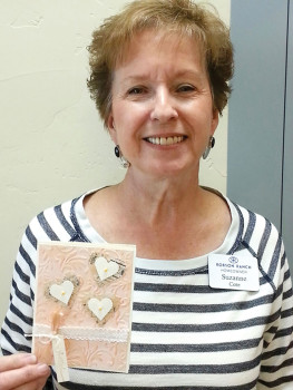 Suzanne Cote with her winning Valentine card.