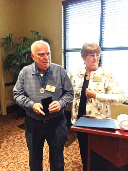 Rich Keehn receiving the Walter Zeller award from our current President, Carol Rauhauser.