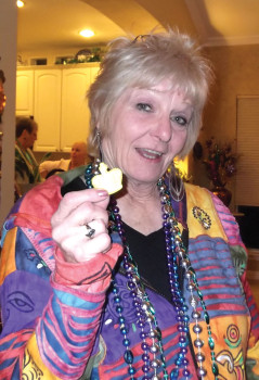 Pam Casalino found the baby in her slice of King Cake; she gets to furnish the King Cake next year!