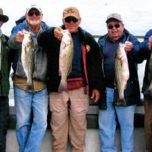 Left to right: Norbert Kronland, Larry Walker, Bob Pervsse, Buddy Beauvis and Jim Galbraith showing off some of their fish.