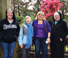 Judy Harris, Barbara Roberts, Susan Parker and Geils Hegranes touring azalea gardens in the rain.