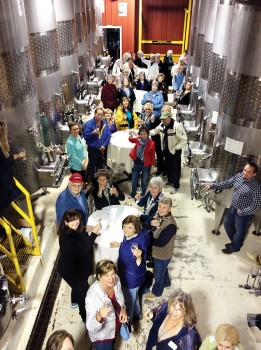 Road Runners enjoy wine tasting in the barrel room at the Kipersol Winery.