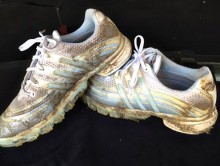 Muddy golf shoes