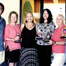 Tournament Chair Ernesto Alvarez presents “Kit-Kat” trophy to Linda Klovans, Humane Society President Lisa Ramirez, Gale Hicks, Susan Miloser, and Cindy Bass.