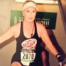 Marsha just as she is finishing the run to the 103rd floor