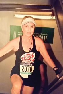 Marsha just as she is finishing the run to the 103rd floor