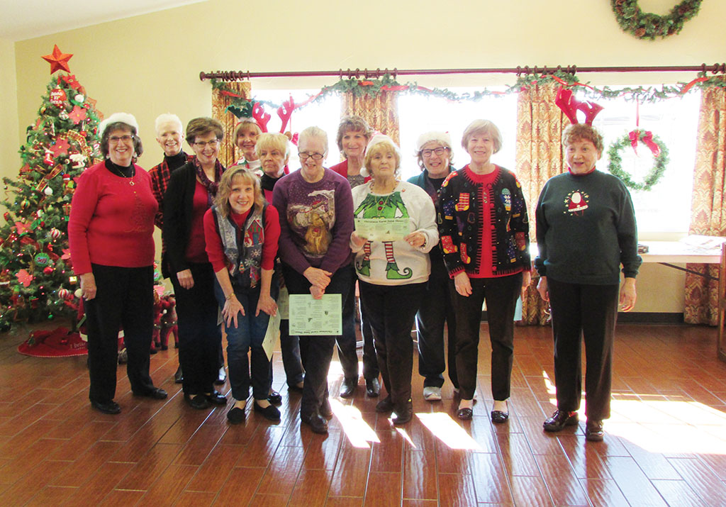 Red Hat Ranchers singing Christmas Carols at Denton Rehab