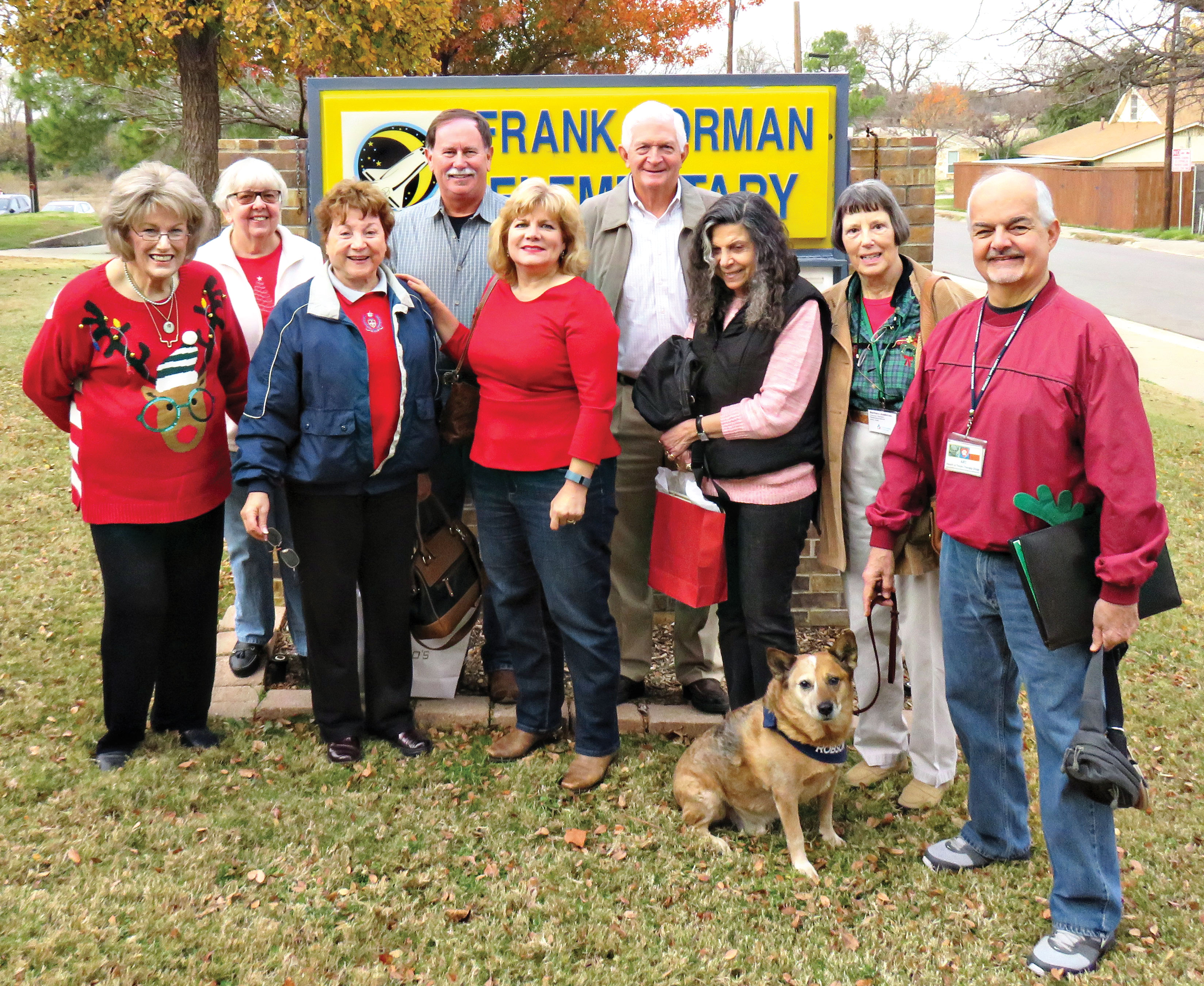 A few of the many volunteers at Borman Elementary including Cody the dog.
