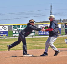 Janet Elizondo puts the tag on a surprised Carlos Muniz at second base.