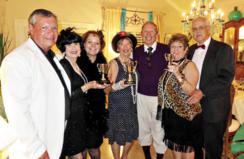Wine Tasting winners, second place: Michael Gilberti, Nancy Toppan and Terry Gilberti; first place: Catherine and Ken Bass; third place: Mary and Roy Bryant