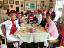 The Ladies with Hattitude enjoying their tea