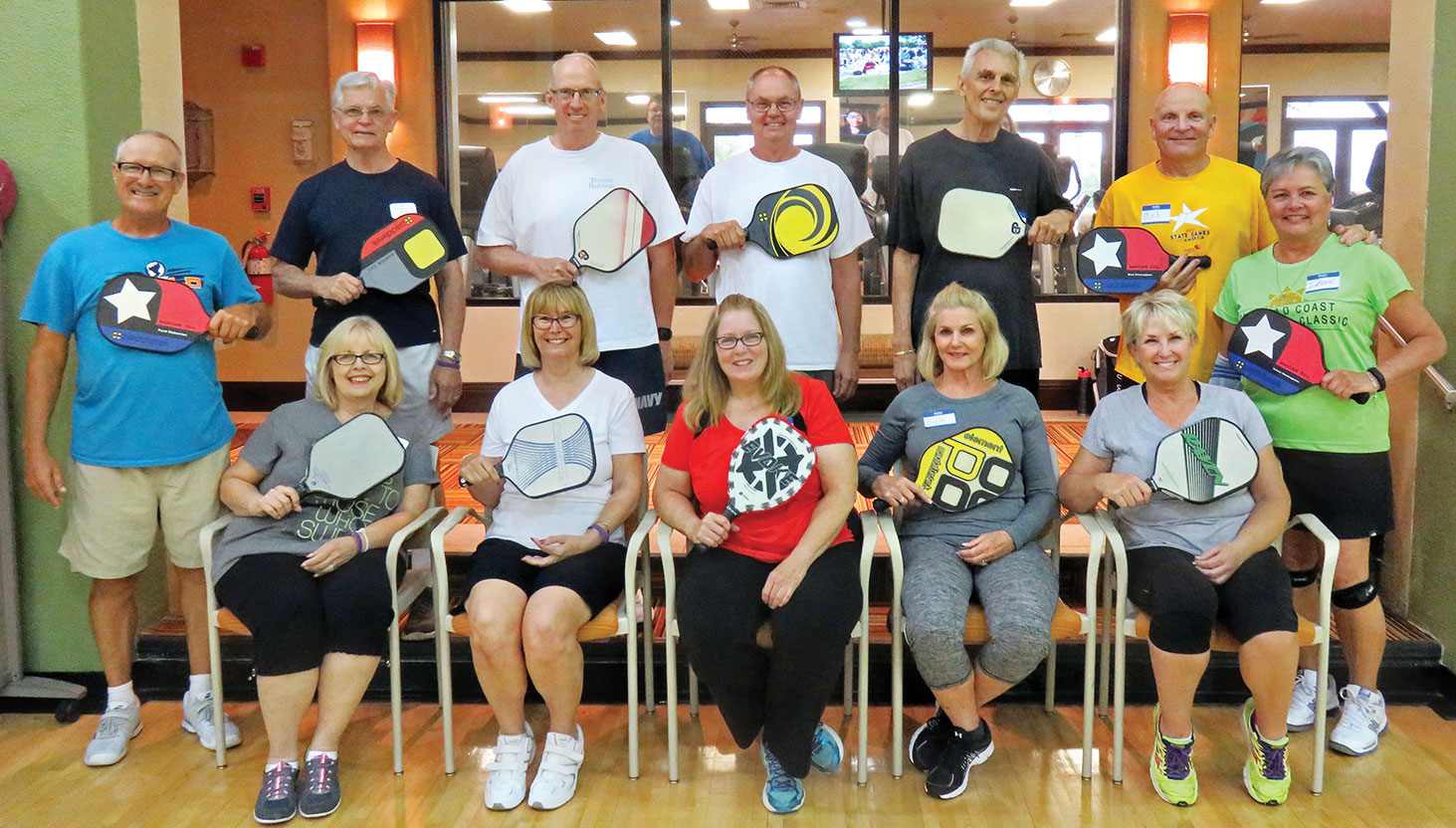 Dr. Ford Roberson and the May graduates of the Pickleball Academy