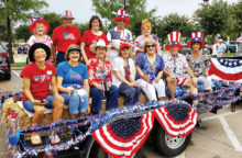 The choir ladies and their 4th of July float