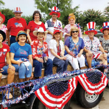 The choir ladies and their 4th of July float
