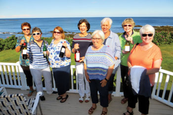 The Party Team, left to right: Beverly Busick, Vicki Baker, Lucy Rees, Barbara Roberts, Donna French, Raynelle Perkins, Donna Williams and Laurie the tour guide