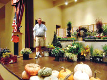 Ty Pointer walks amongst his plant filled stage