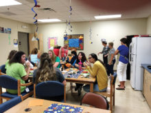 Teachers and staff enjoy a Subway lunch.