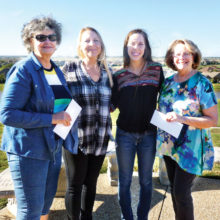 Fellowship at the Ranch Church members Doris Koenig, left, of Robson Ranch and Edie Jones, far right, present Lynnie Anderson, City Director, second from left, and Lexie Chamberlain, volunteer, a check from Fellowship at the Ranch.