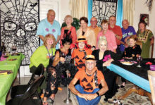 Left to right, back row: CT Robertson, Beverlee Deardorff, Millie Aramanda, Mike Aramanda, Cheri Snowden, Charlie Snowden, Jere Bone and Charlene Cottingham; middle row: Kathy Perry, Vickie Bone, Nancy Toppan, Vivian Wright and Brenda McKenzie; front row: Pete Toppan