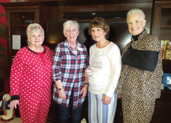 Former Queens Jan Utzman, Nanci Zipes and Glenda Brown gather to discuss club activities with current Queen Phyllis Ayers (second from right).
