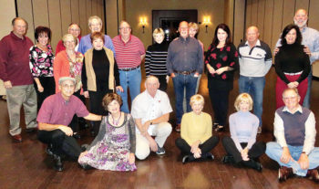 Front row, sitting: Pete and Nancy Toppan, Paul Gage, Mary Ann Rich, Mary Jo Beldings and Pete Beldings; standing: Jim and Dee Sico, Bobbie and Jim McGill, Geraldine Gawle, Henry Evans, Ken Dubois, Glenda Brundage, Ken and Sheri Quarfoot, Gisela Troncoso, Dan Rich and Letha and Jay Straub