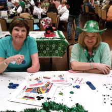 Casino ticket takers and chip gals Joi Wilson, left, and Patti Kelly