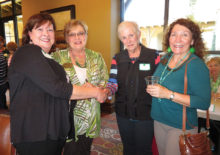 Sharon Foy, Paula Monroe and Judy Ondina welcoming guests