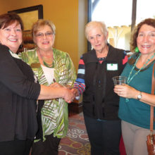 Sharon Foy, Paula Monroe and Judy Ondina welcoming guests