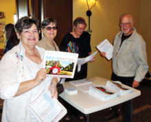 Gathering at the Brain Health seminar registration table