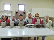 Linda Becker, Carolyn Detjen, Nancy Lussier, Liz Katz, Jan Marx and Sarah Cunningham show off the beginnings of sculptures.