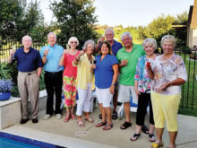 Left to right, front row: Ed Bone, Marv Daniel, Beverlee Deardorff, Paula Bone, Cindy Brekke, Dale Brekke, Bev Daniel, Pam Kanawyer; Wayne Lussier is in the back center; photo by Tom Kanawyer