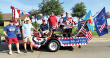 The Brothers of Sigma Chi and their 4th of July float