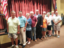 First place: Pat Powers, Catherine Roberson, Jeff Duncan, Jim Hendricks, Alice Hendricks, Mike Lamp, Jan Lamp and Dennis Ogren with sponsor Carl Edwards and Activities Coordinator Althea Parent