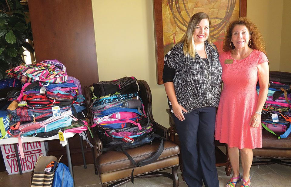 A sample of the donated backpacks and school supplies for Friends of the Family