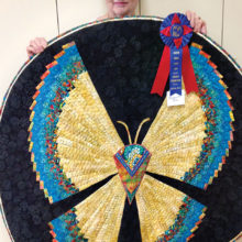 Marguerite Rose and her butterfly quilt