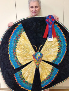 Marguerite Rose and her butterfly quilt