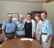 Fred and Karolyn Nelson, left, and Barbara and Dick Anderson, right, residents of Robson Ranch, talk with Khaleigh Rose Hopkins at First Christian Church, Denton, about her new job as the church’s Children’s Resource Coordinator and her plans to study for the ministry.