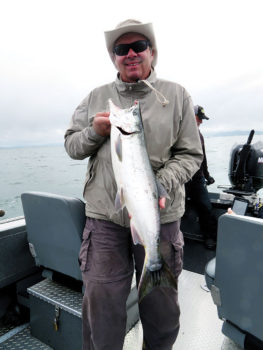 Randy Shoff showing off his Coho!
