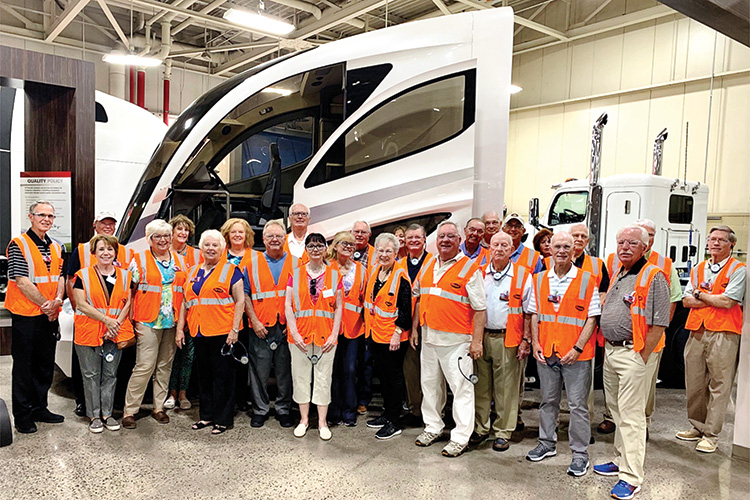 Robson Ranch residents enjoying and appreciating a tour of the Denton Peterbilt plant.